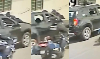 VIDEO: Se niega a pagar el parquímetro y se lleva en el cofre a un policía